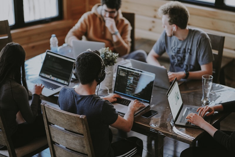 SysInteractive team collaborating in modern office